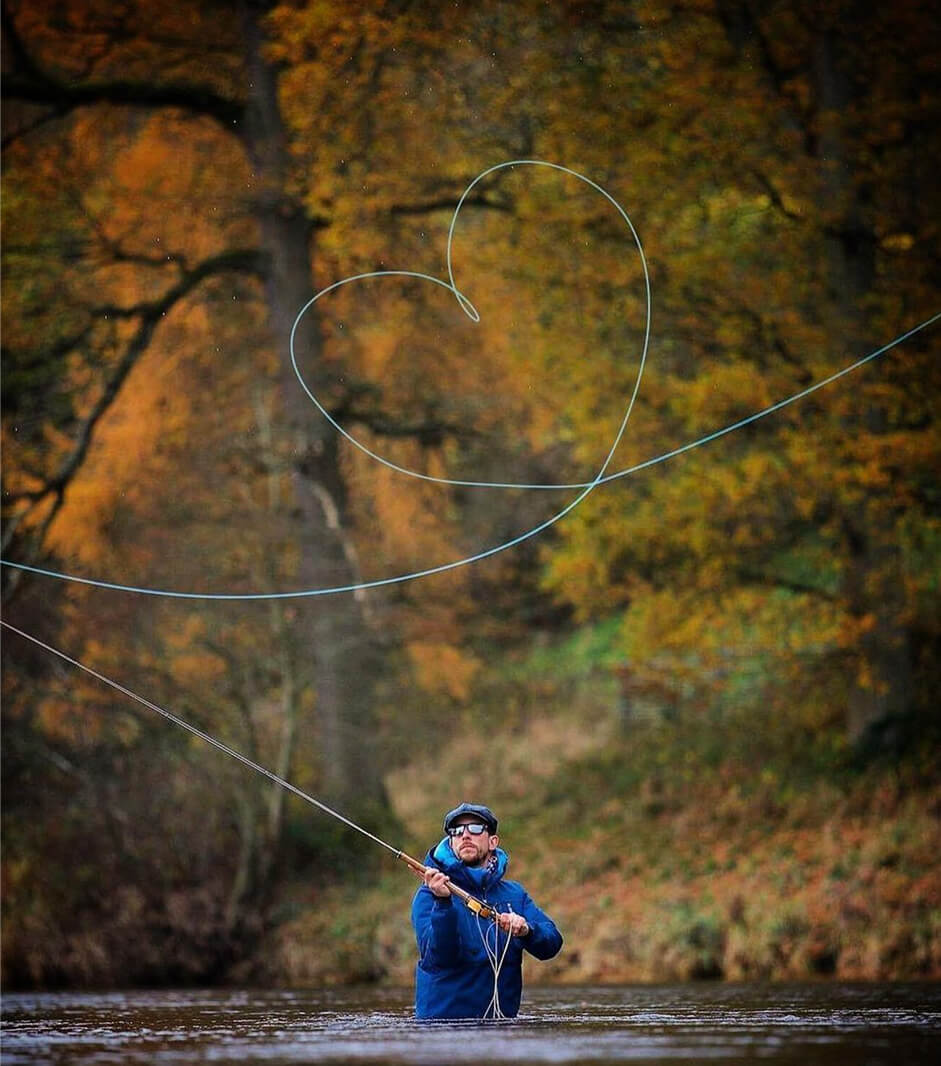 Angler using Loop equipment casting his line in the shape of a heart