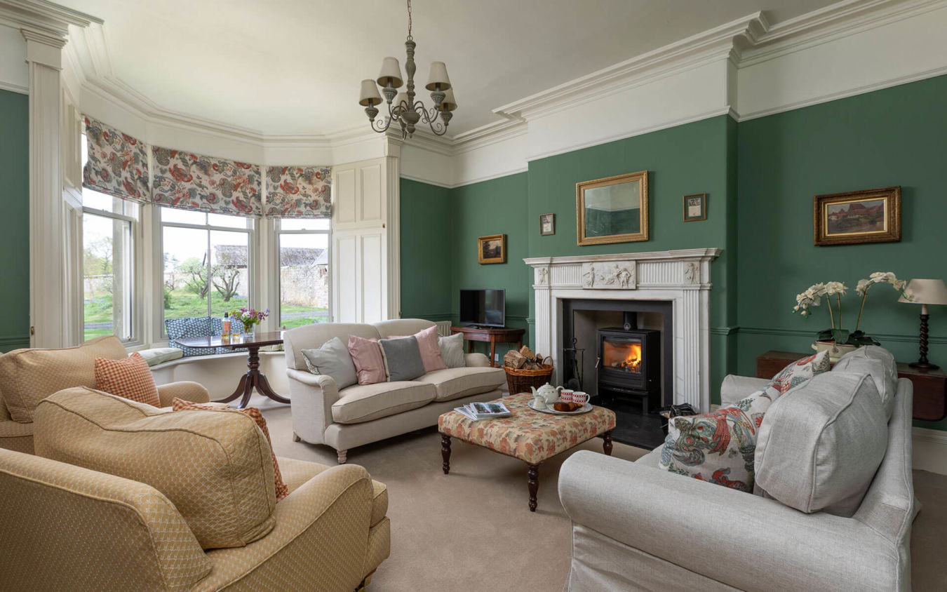 Large northumberland holiday home hosted by Wild Plum Crookham Eastfield Farmhouse living room