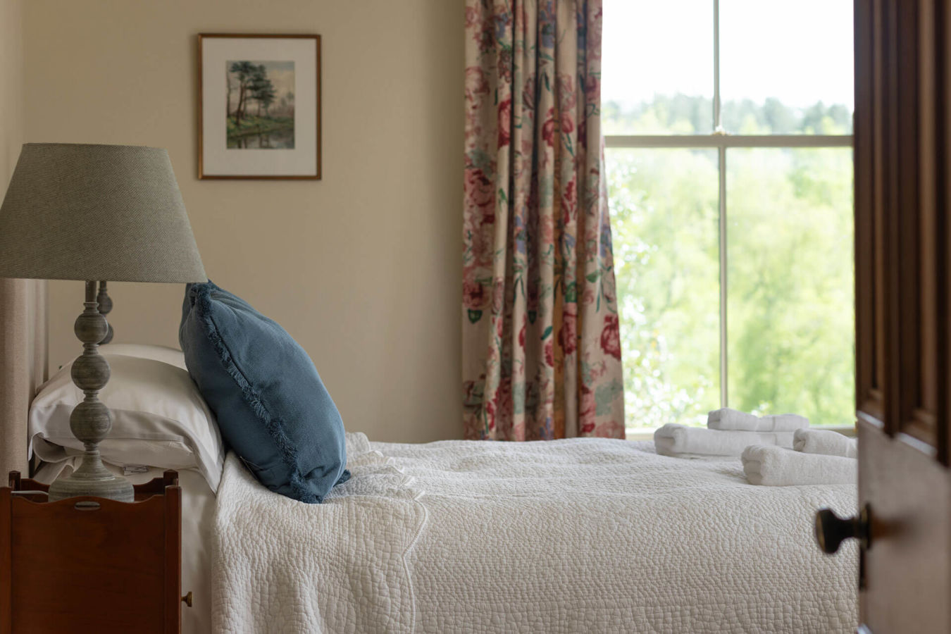 View across bed in the double bedroom Crookham Eastfield Farmhouse